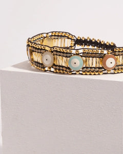 Choker artesanal de lujo dorado con cuentas y detalles coloridos de Erika Valencia